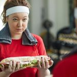 Woman with sandwich